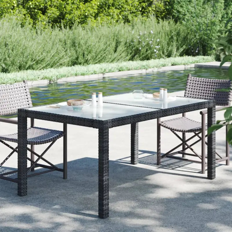 Poly rattan tuintafel met gehard glas voor een stijlvolle buitenruimte - Zwart en wit / 150 x 90 x 75 cm / 1