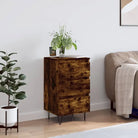 Trendy dressoir met metalen poten en bewerkt hout voor een tijdloze look - Dressoirs & buffetkasten