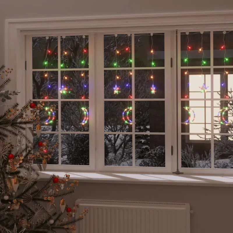 Energiebesparende LED’s kerstverlichting met sterren en manen en lange verlengkabel - kleurrijk / 345 led / 1