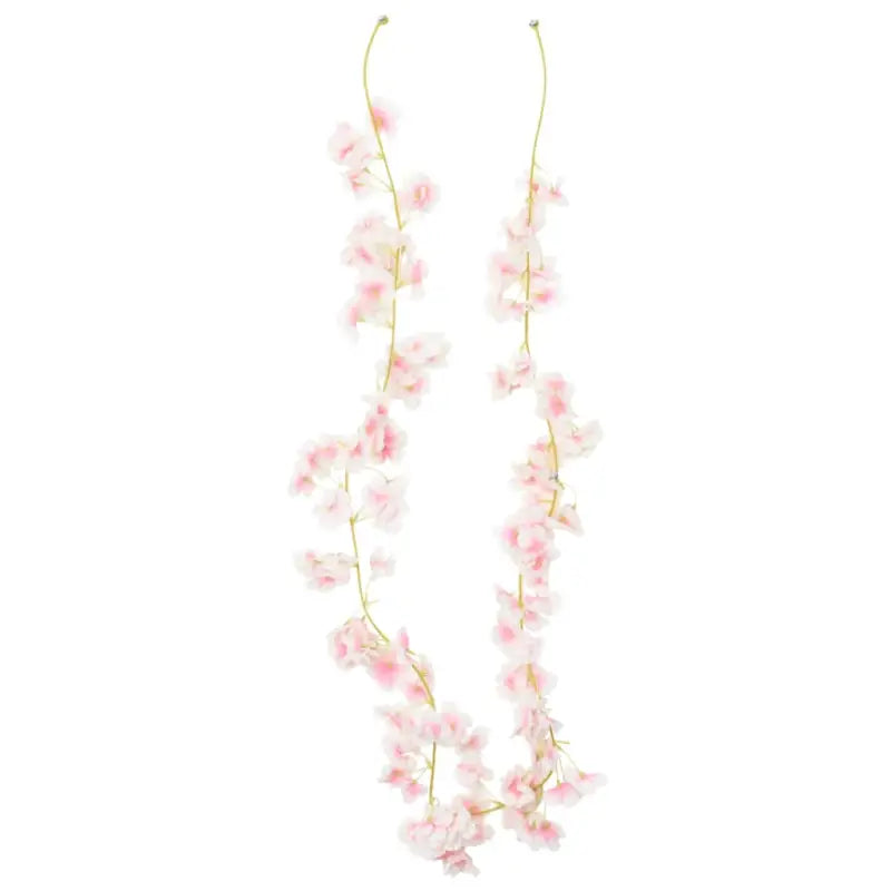 Kransen en slingers met bloemen voor een romantische feestdecoratie - Kransen en slingers