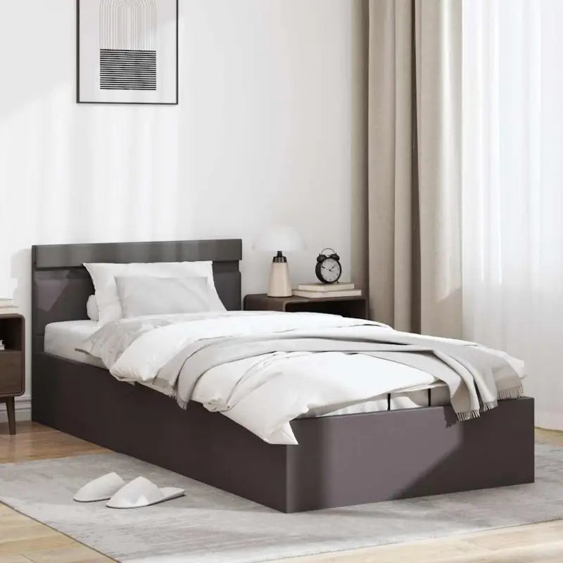 Moderne hydraulische eenpersoonsbed met multiplex lattenbodem en kunstleren bekleding - Bedden & bedframes
