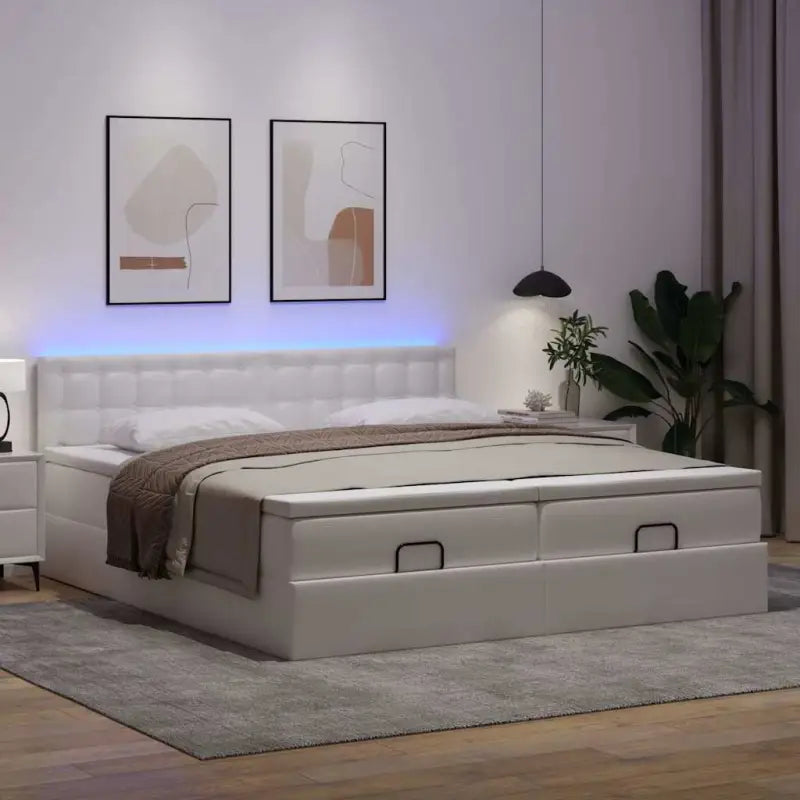 Ottomaans bed met wit materiaal en ruime opbergruimte - Bedden & bedframes