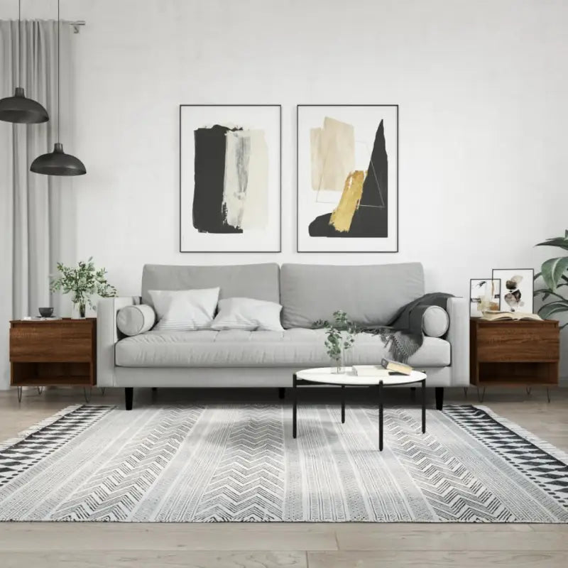 Salontafel met bewerkt hout en metalen poten voor een elegante woonkamer - Salontafels