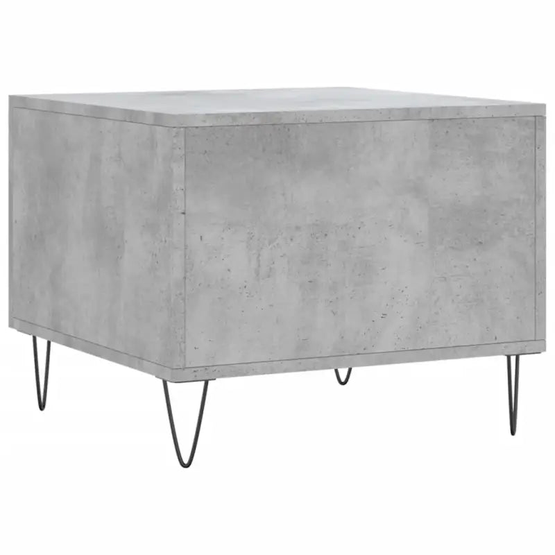 Salontafel met ijzeren poten en bewerkt hout voor een elegante woonkamer - Salontafels