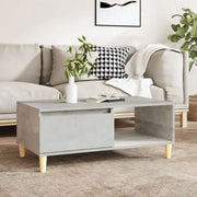 Scandinavische salontafel met bewerkt hout en houten poten - Salontafels