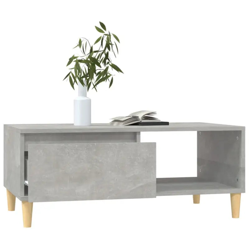 Scandinavische salontafel met bewerkt hout en houten poten - Salontafels