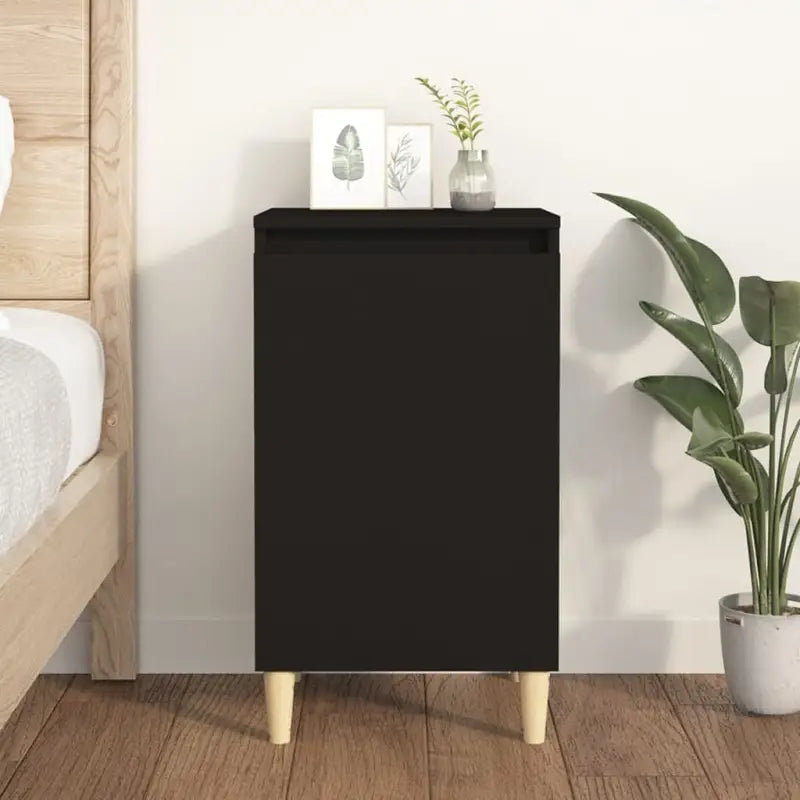 Stijlvol nachtkastje met houten poten en bewerkt hout voor een elegante inrichting - Zwart / 1 - Nachtkastjes