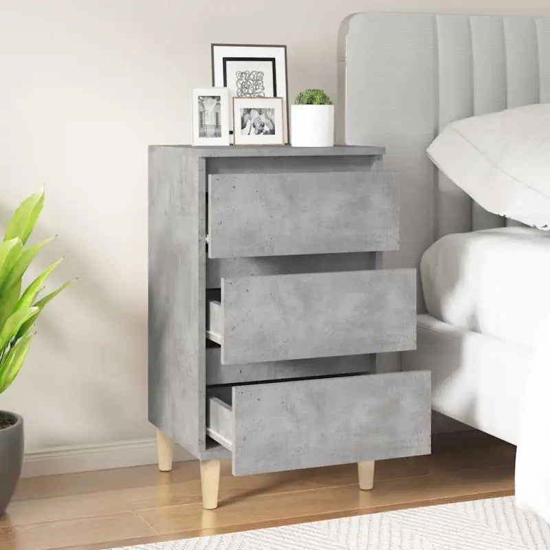 Trendy nachtkastje met houten poten en bewerkt hout voor een strak interieur - Nachtkastjes