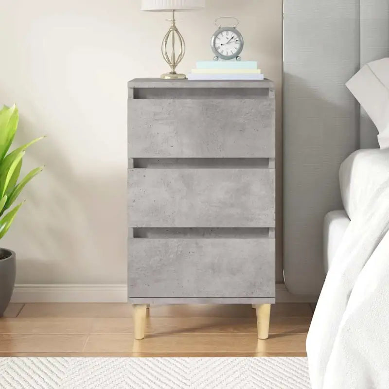 Trendy nachtkastje met houten poten en bewerkt hout voor een strak interieur - Nachtkastjes