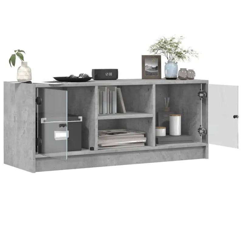 Tv-meubel met glazen deuren en bewerkt hout voor een strakke look - Tv-meubels